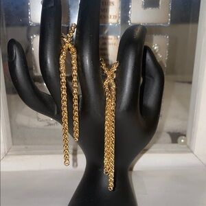 Dangling gold earrings